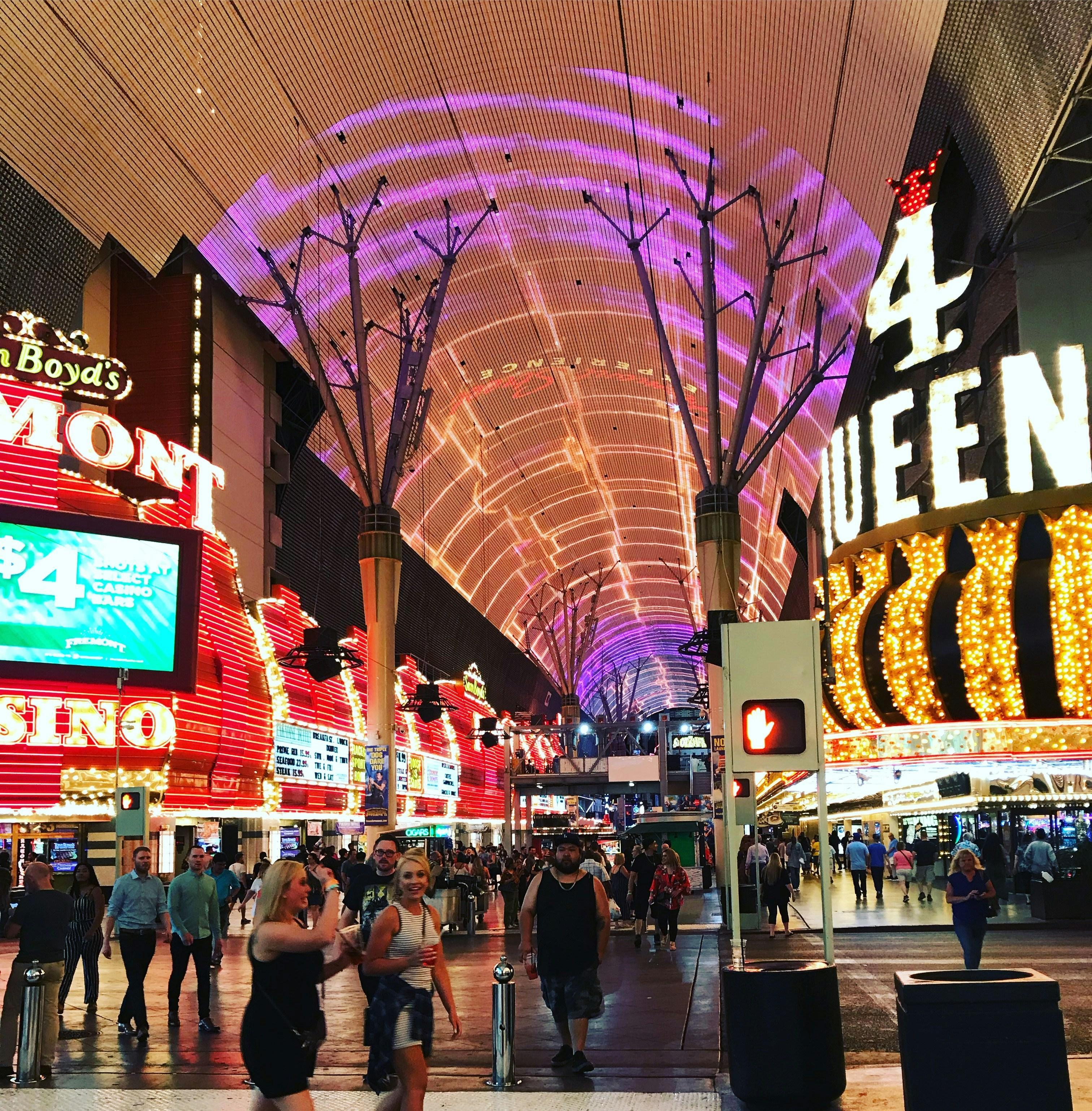 Las Vegas Strip fireworks and celebrations on New Year's Eve with crowds and bright neon lights