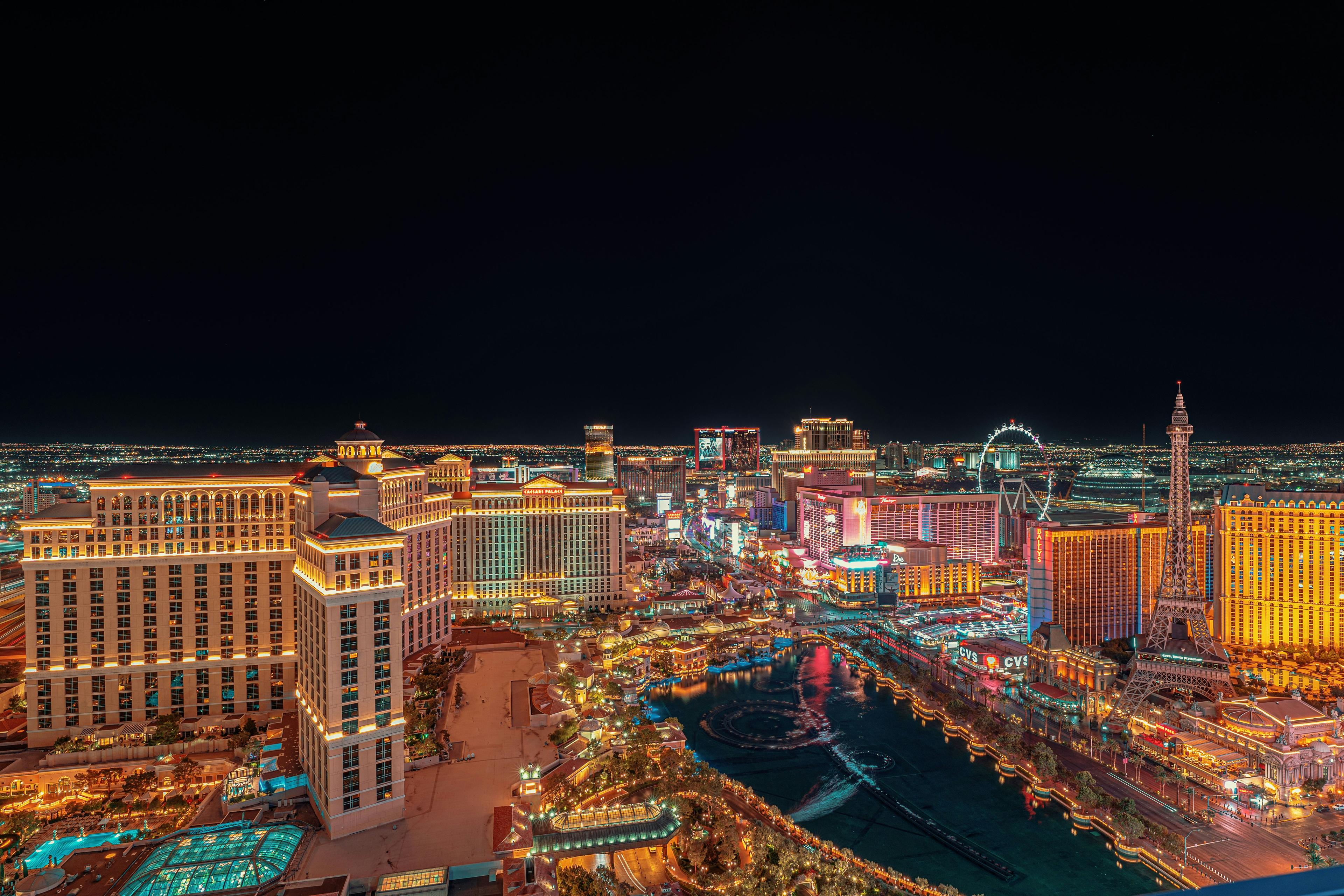 The Sphere entertainment venue in Las Vegas glowing with colorful LED displays at night